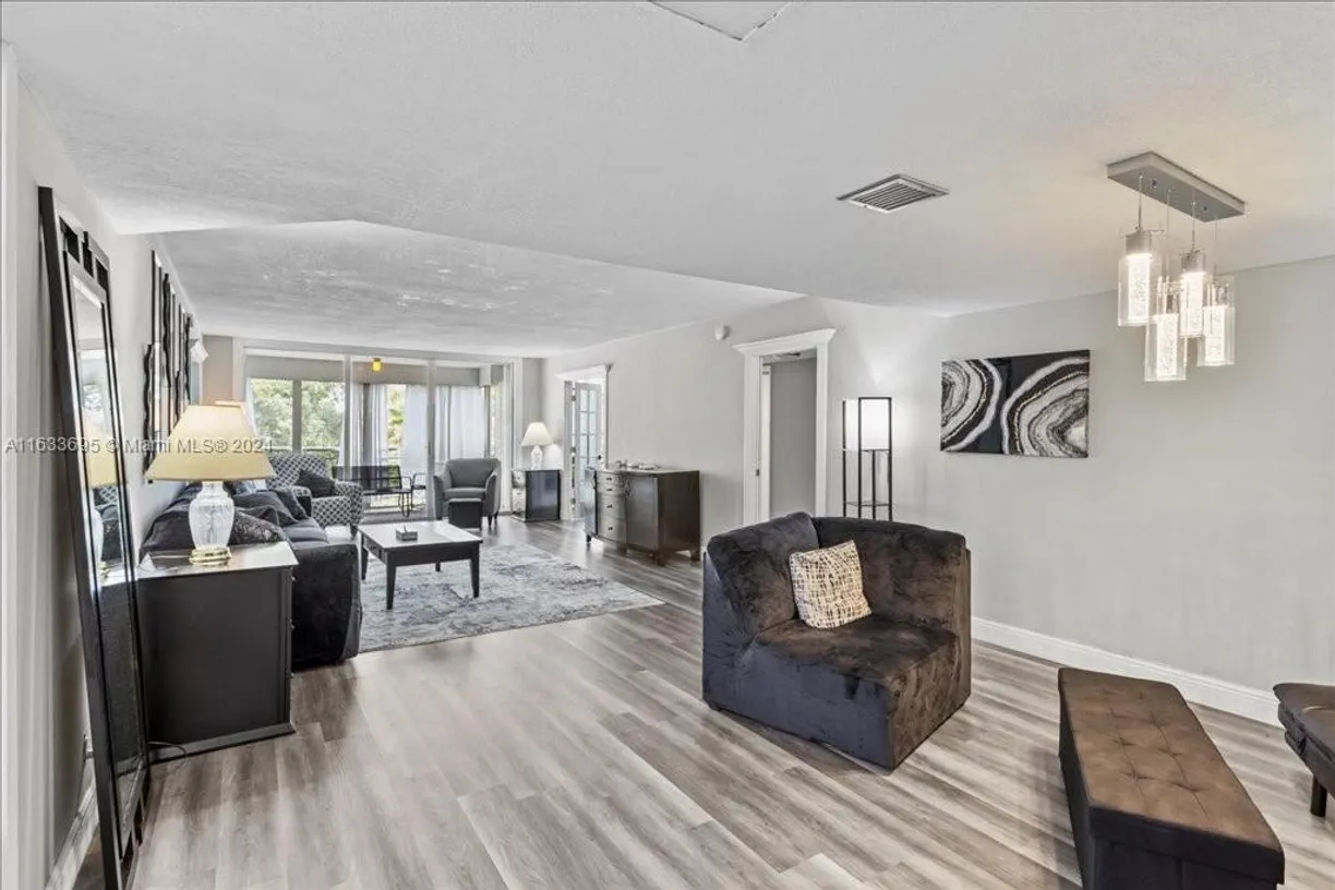 South Florida Real Estate | View 3980 Oaks Clubhouse Dr, 303 | 3 Beds, 2 Baths