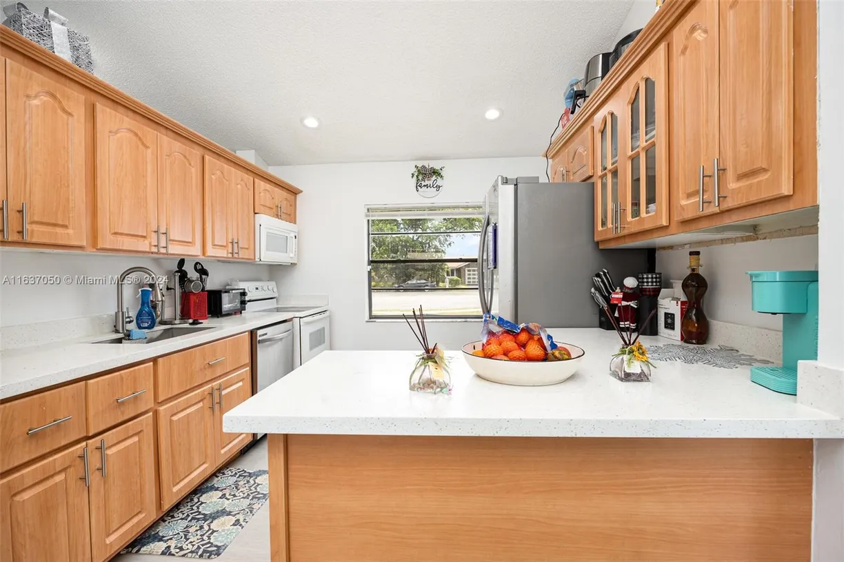 South Florida Real Estate | View 8205 SW 12th Pl | 3 Beds, 2 Baths