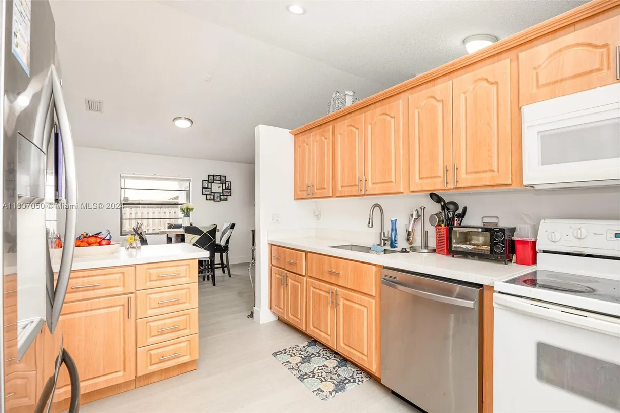 South Florida Real Estate | View 8205 SW 12th Pl | Listing