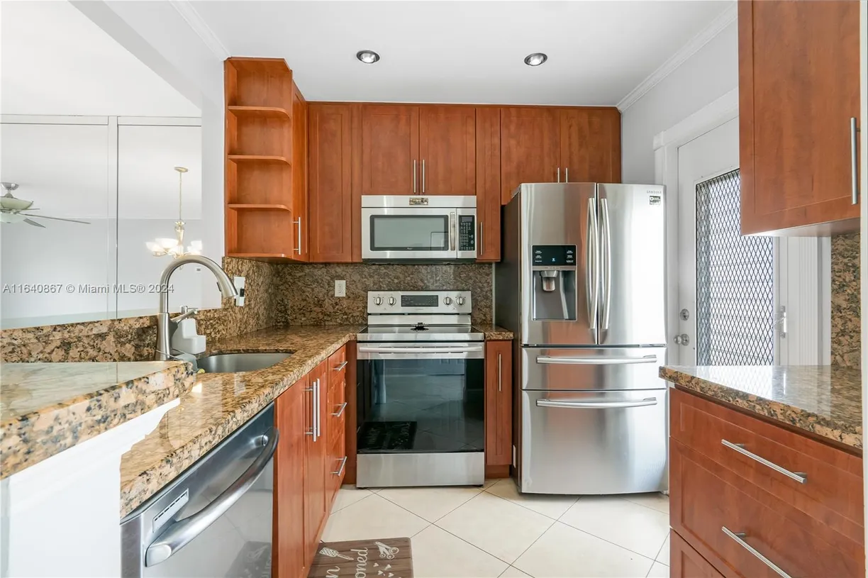 South Florida Real Estate | View 4411 NW 16th St, F103 | Listing