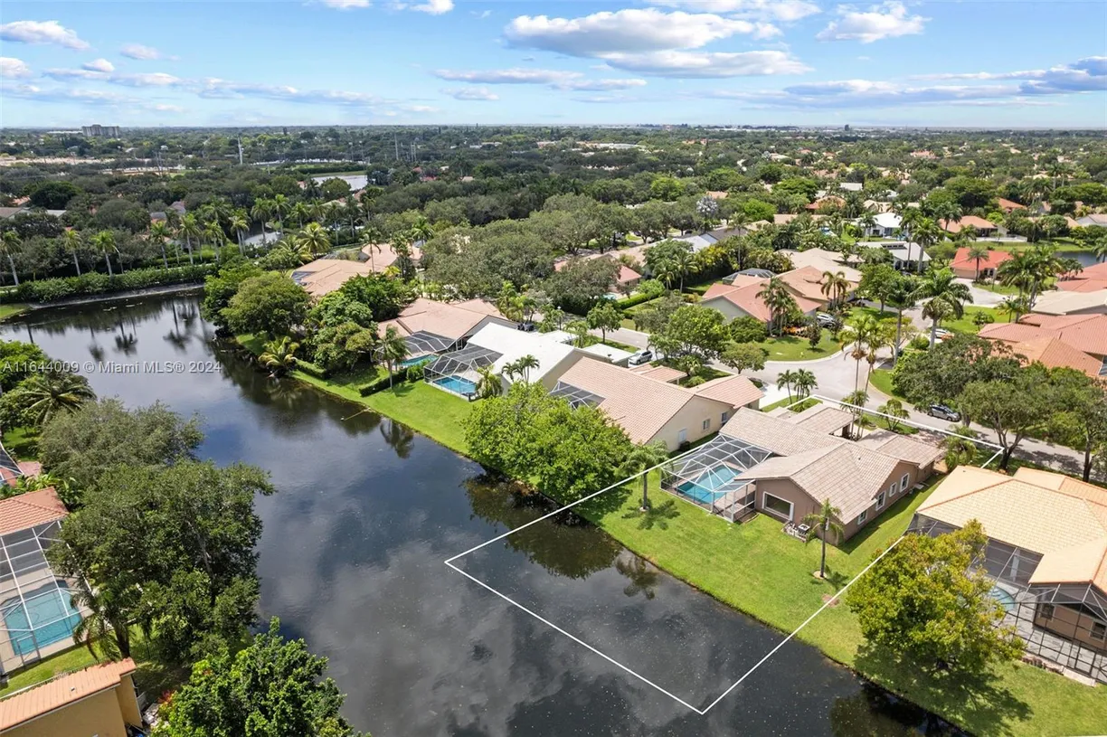 South Florida Real Estate | View 5001 NW 103rd Ave | 4 Beds, 3 Baths