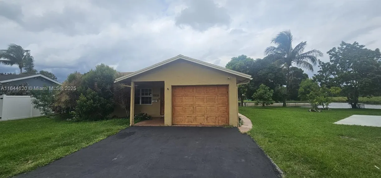 South Florida Real Estate | View 6605 NW 77th St | Listing