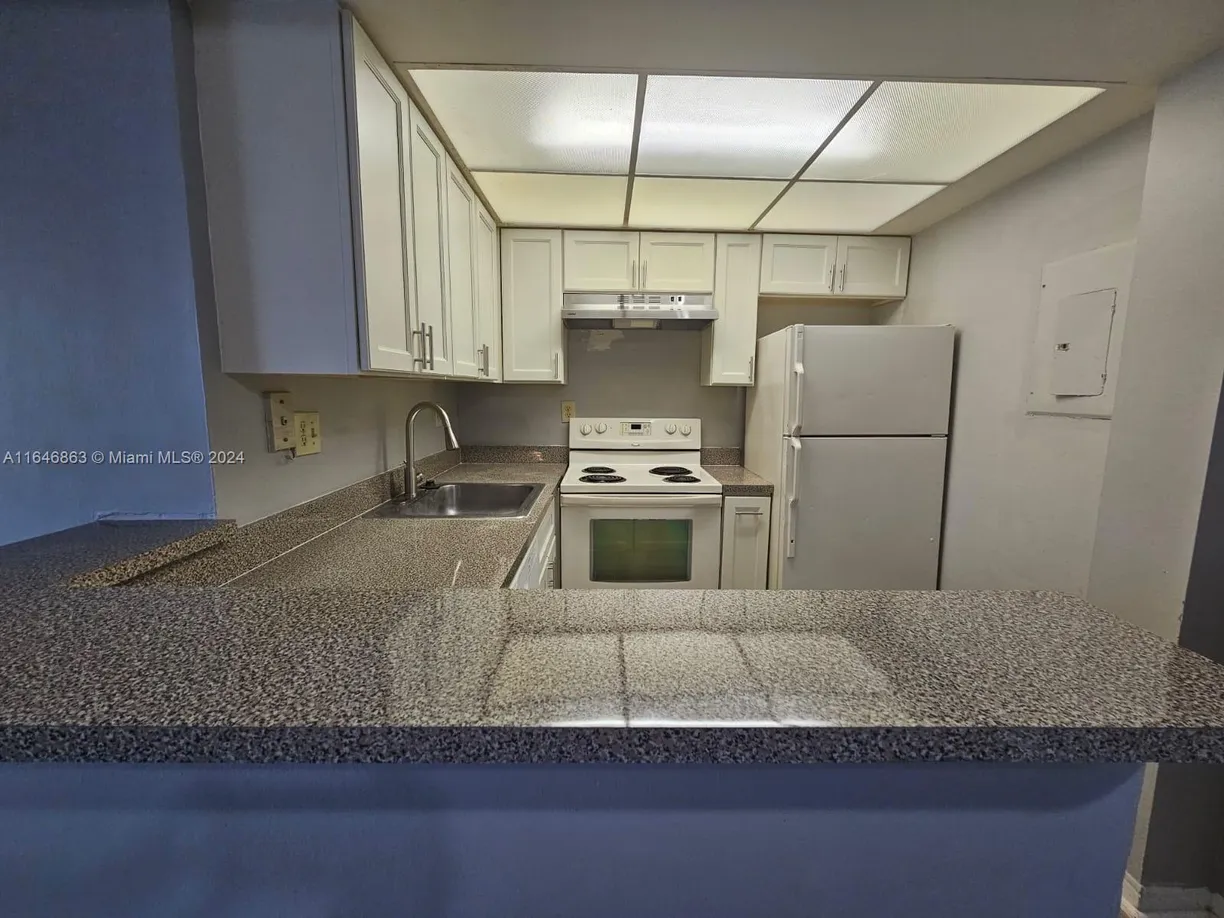 South Florida Real Estate | View 734 Executive Center Dr, 32 | 2 Beds, 2 Baths