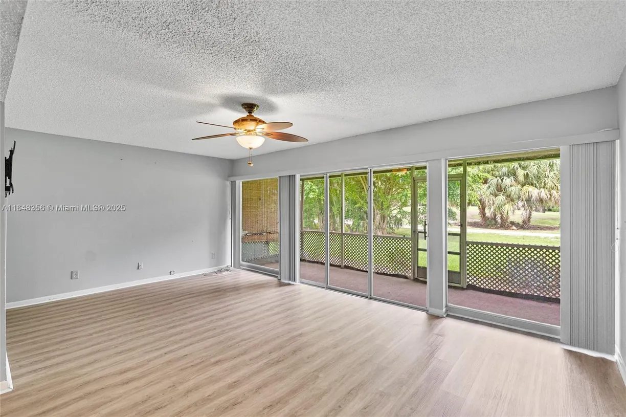 South Florida Real Estate | View 8145 Lagos De Campo Blvd, D-1 | 2 Beds, 1 Bath