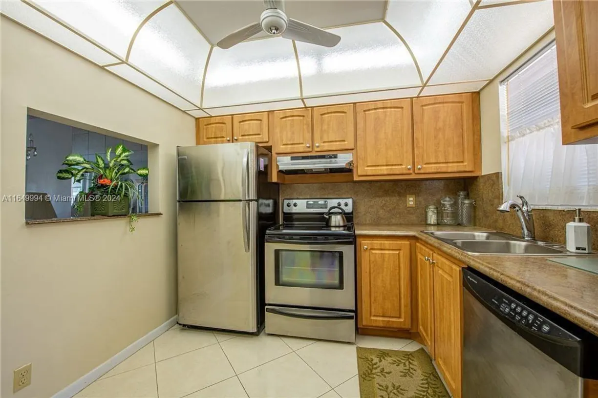South Florida Real Estate | View 6700 Royal Palm Blvd, 103D | Listing