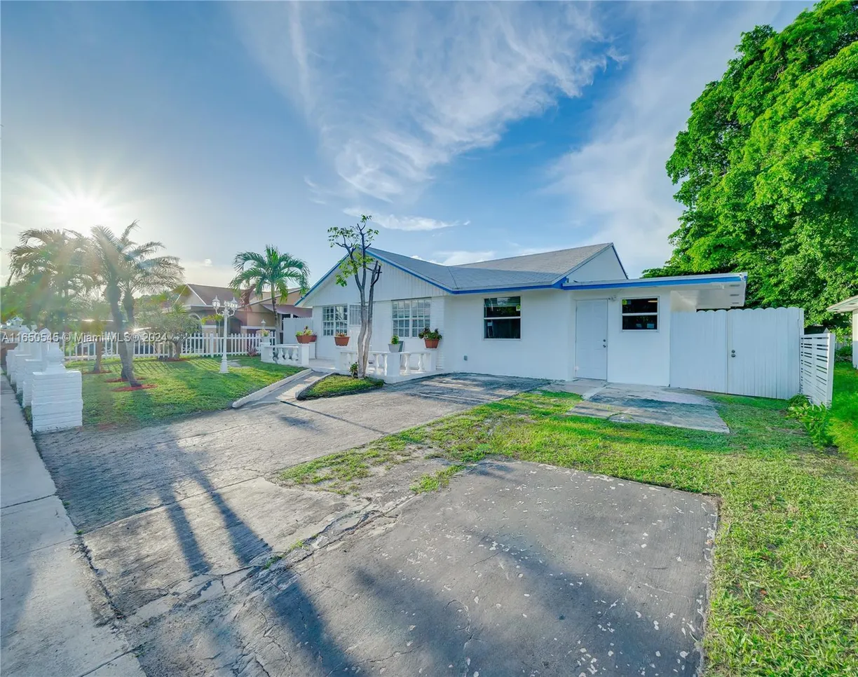 South Florida Real Estate | View 725 NW 15th Ct | 4 Beds, 1 Bath