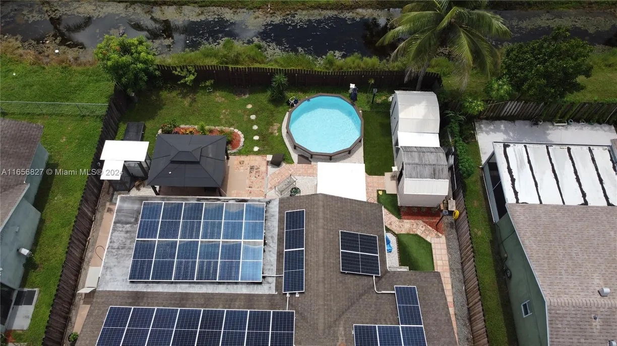 South Florida Real Estate | View 9430 Saddlebrook Dr | 4 Beds, 2 Baths