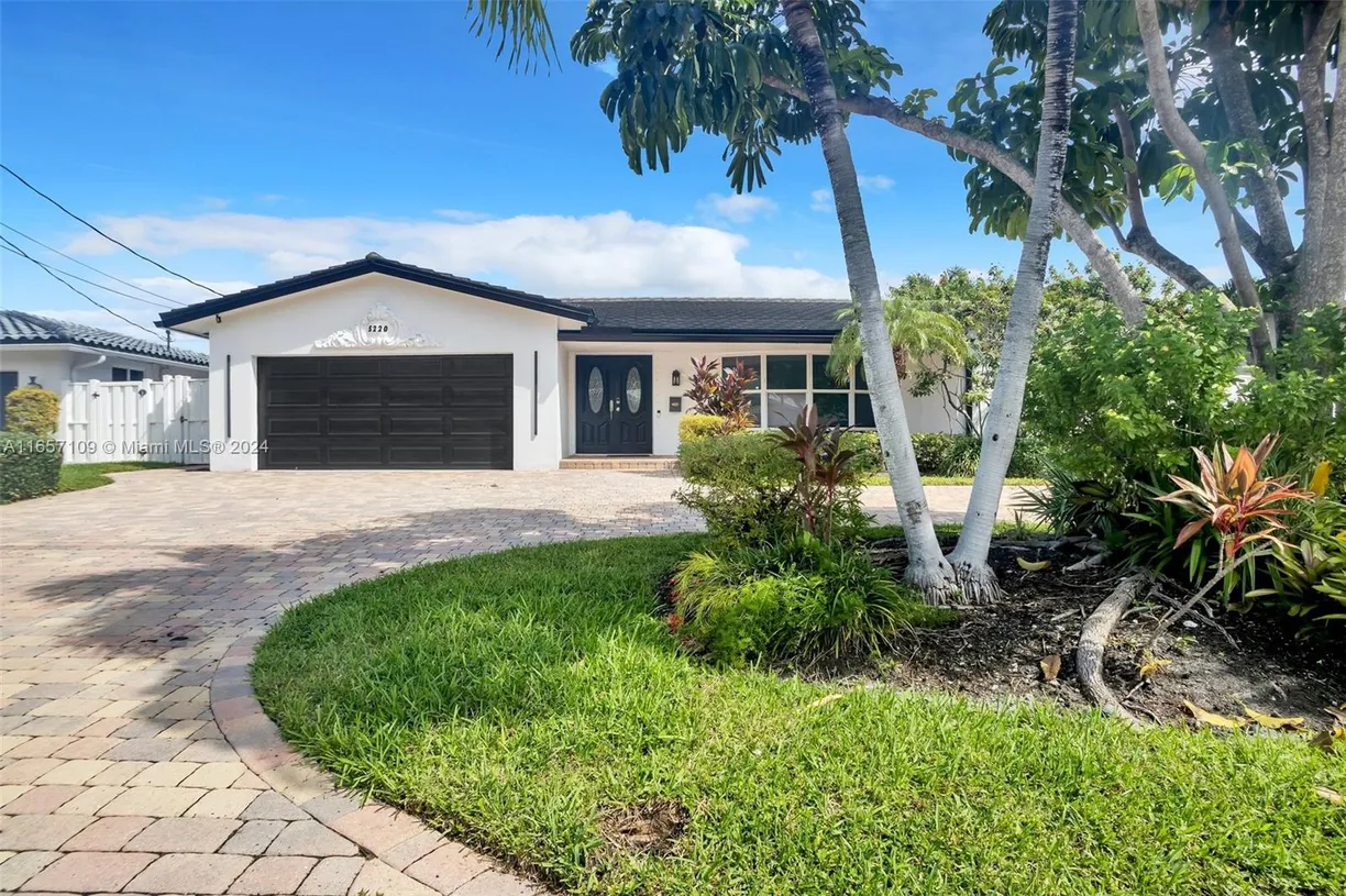 South Florida Real Estate | View 5220 NE 26th Ave | 4 Beds, 3 Baths