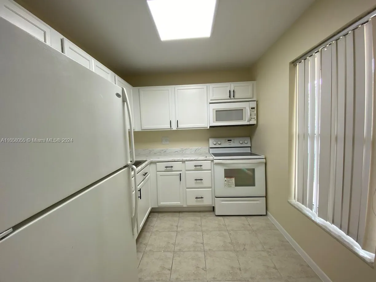South Florida Real Estate | View 6071 NW 61st Ave, 107 | 1 Bed, 1 Bath