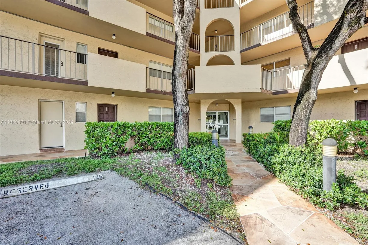 South Florida Real Estate | View 6061 N Falls Cir Dr, 110 | Listing