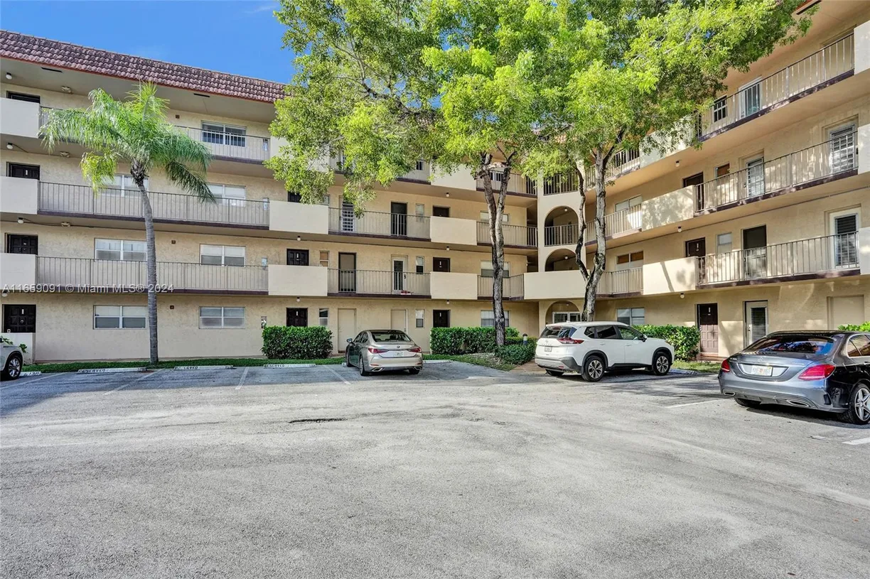 South Florida Real Estate | View 6061 N Falls Cir Dr, 110 | 2 Beds, 2 Baths