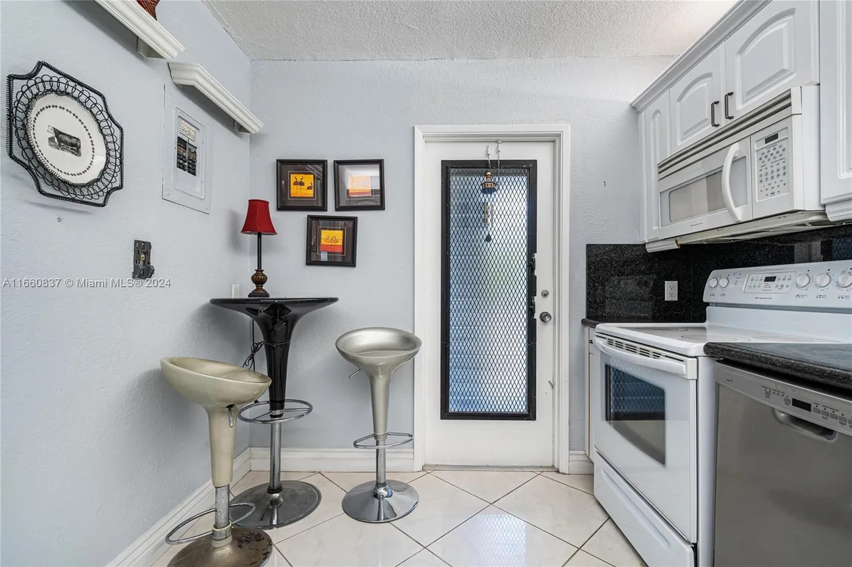 South Florida Real Estate | View 2600 S Course Dr, 301 | Listing