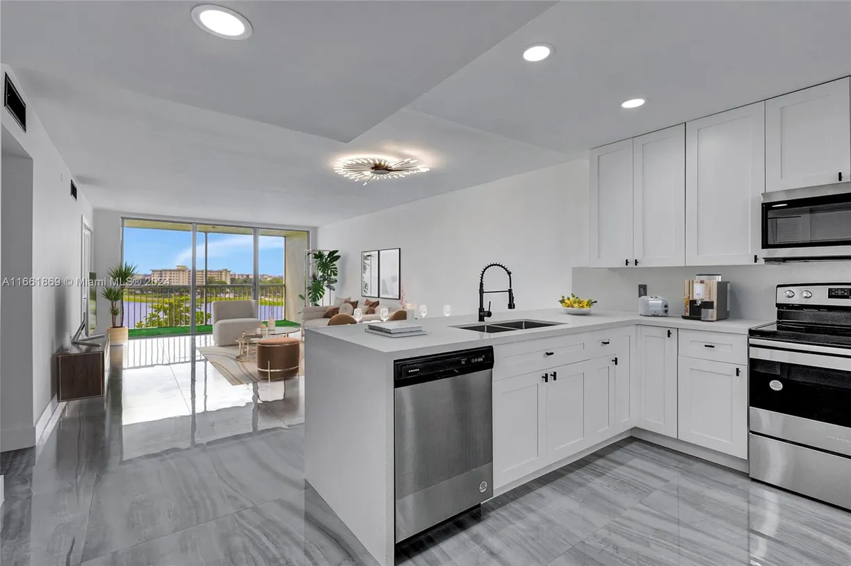 South Florida Real Estate | View 3091 N Course Dr, 702 | Listing