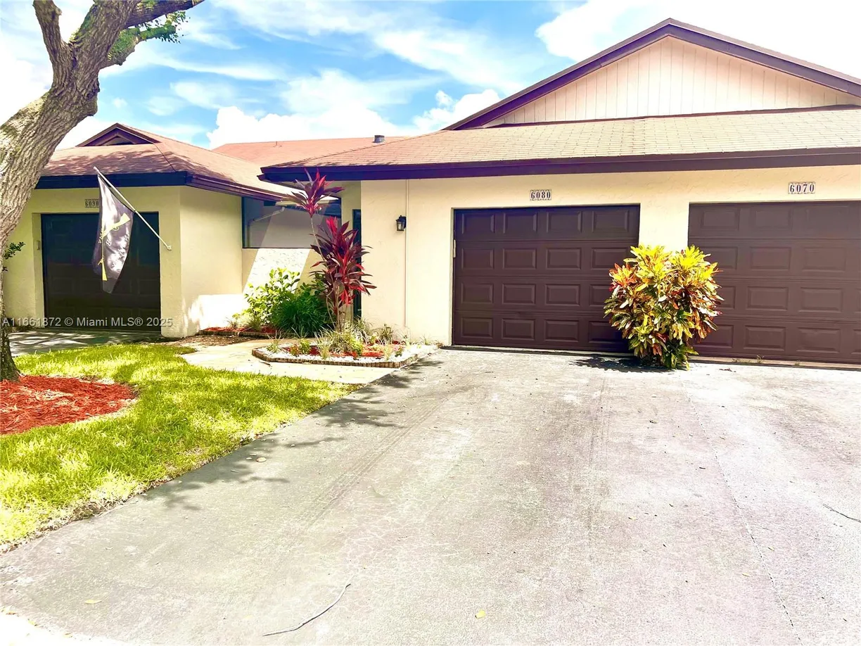 South Florida Real Estate | View 6080 NW 92nd Ave | 2 Beds, 2 Baths