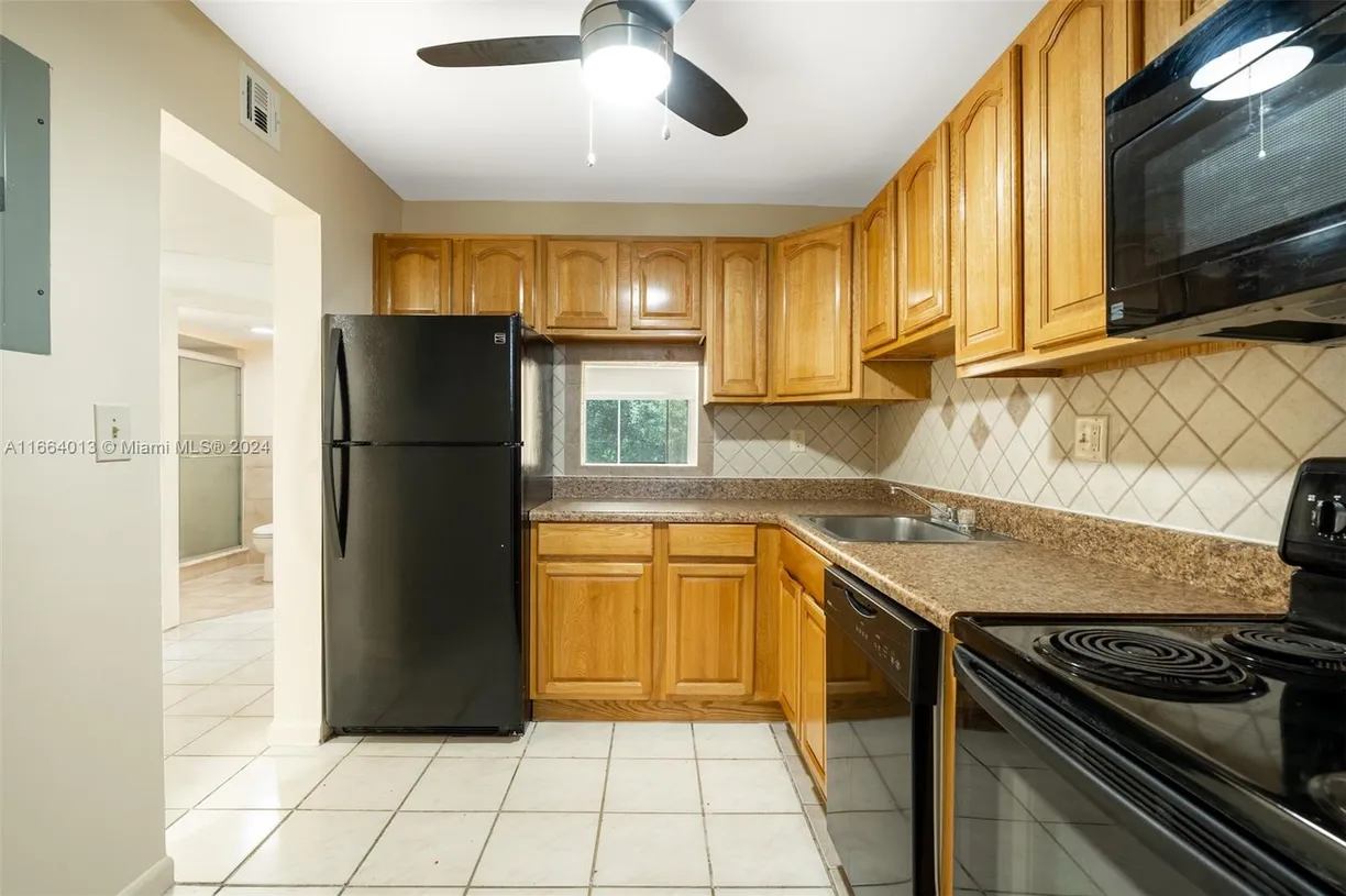 South Florida Real Estate | View 7900 S Colony Cir S, 101 | 2 Beds, 2 Baths