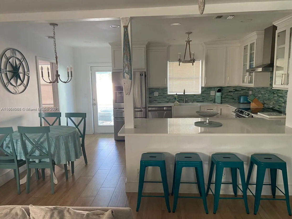 South Florida Real Estate | View 2411 N 59th | 3 Beds, 2 Baths