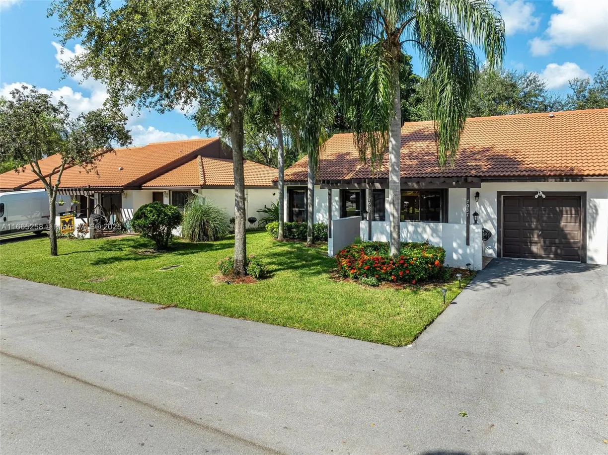 South Florida Real Estate | View 7037 Marlberry Ln | 2 Beds, 2 Baths