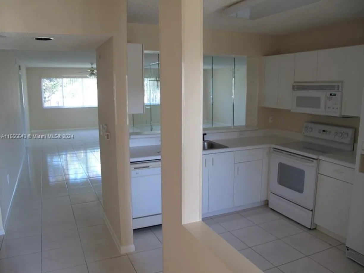 South Florida Real Estate | View 9511 Weldon Cir, G215 | 2 Beds, 2 Baths