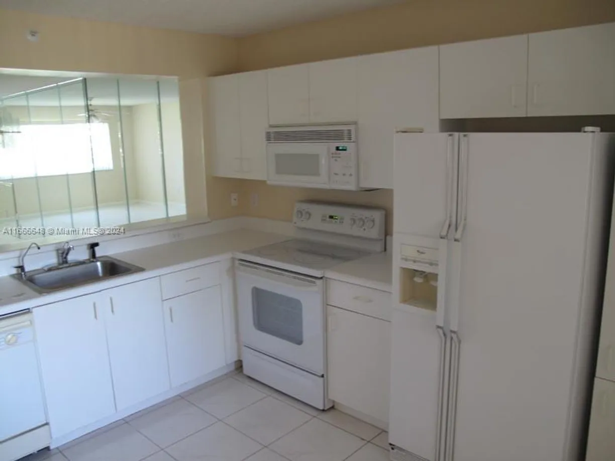 South Florida Real Estate | View 9511 Weldon Cir, G215 | Listing