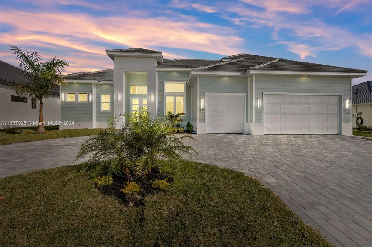 South Florida Real Estate | View 2129 Cape Coral Parkway W | 4 Beds, 4 Baths