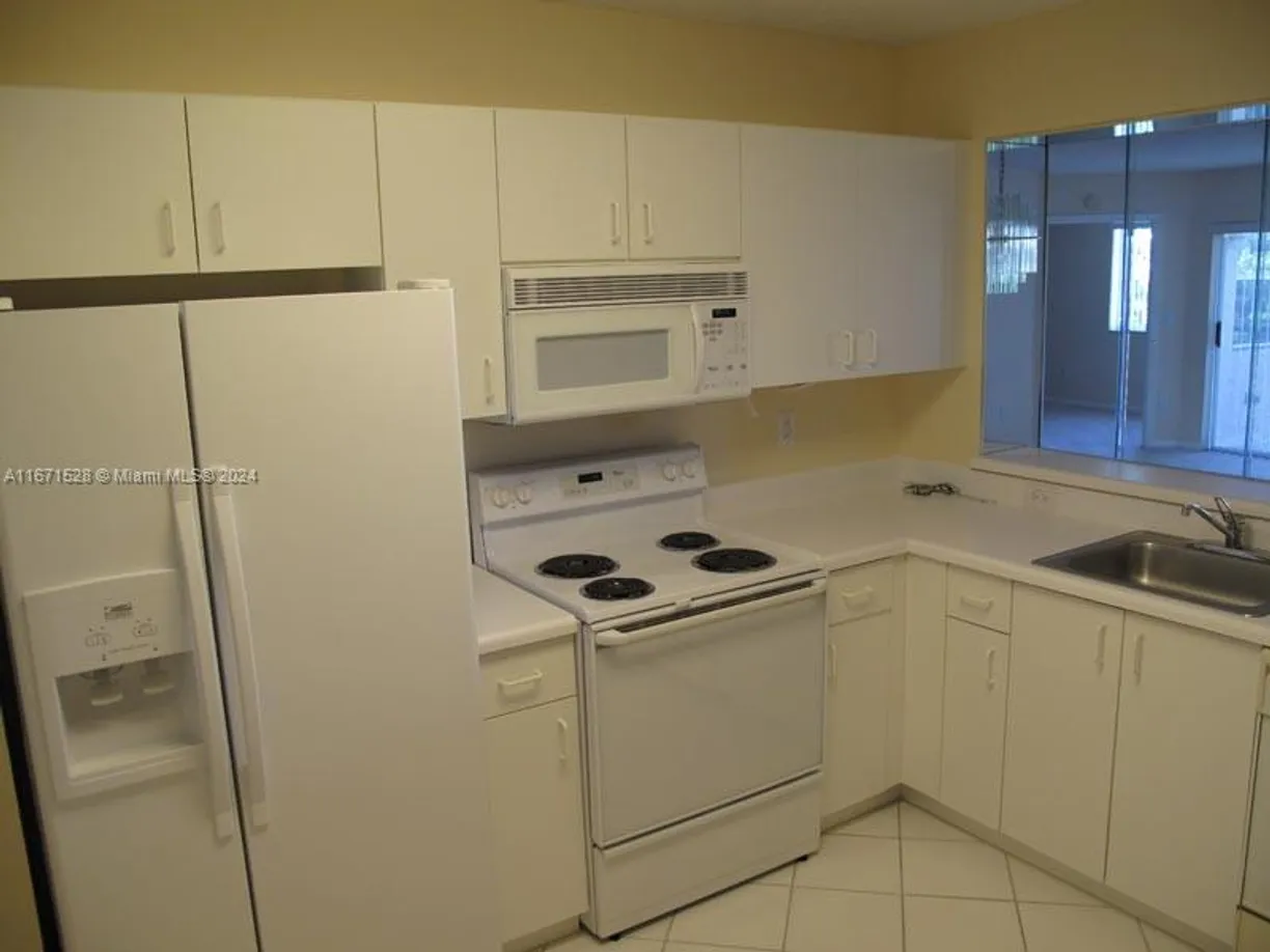 South Florida Real Estate | View 9511 Weldon Cir, G402 | 2 Beds, 1 Bath