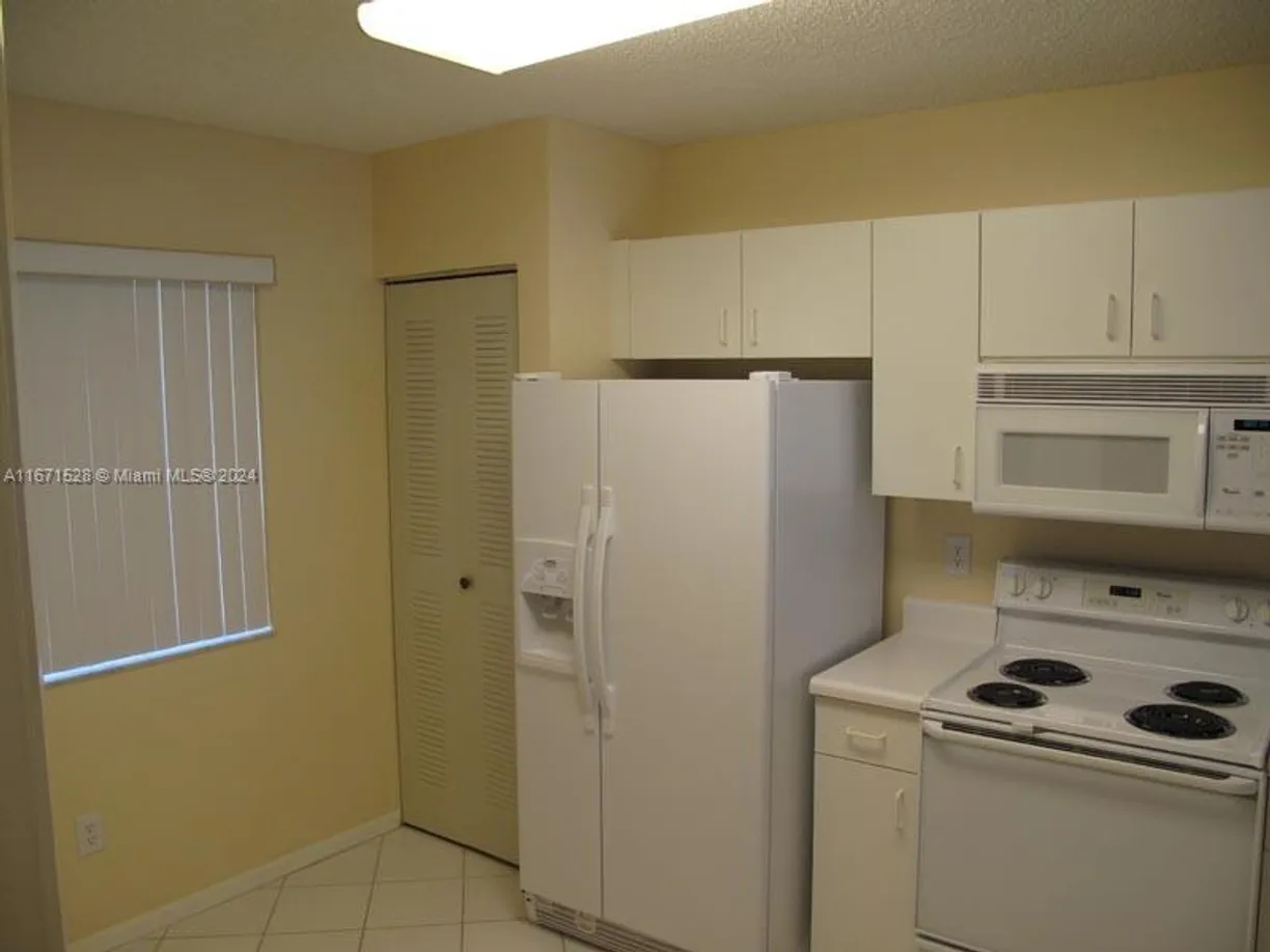 South Florida Real Estate | View 9511 Weldon Cir, G402 | Listing