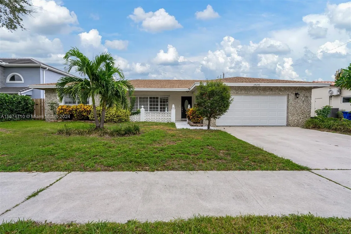 South Florida Real Estate | View 2505 NE 35th Dr | 4 Beds, 2 Baths