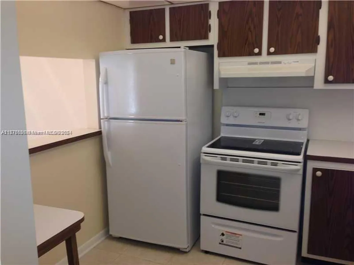 South Florida Real Estate | View 6570 Royal Palm Blvd, 107J | Listing
