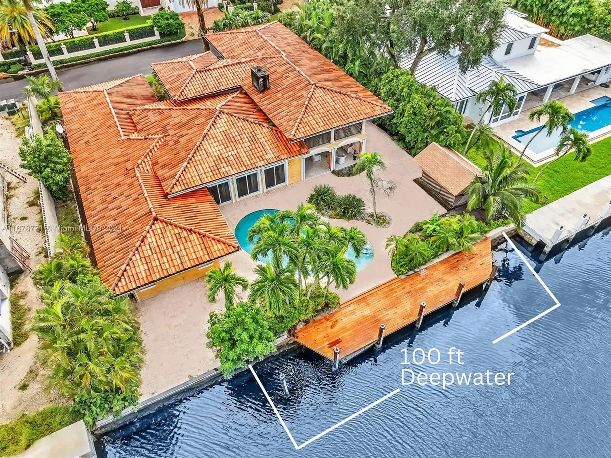 South Florida Real Estate | View 449 Isle Of Palms Dr | 5 Beds, 4 Baths