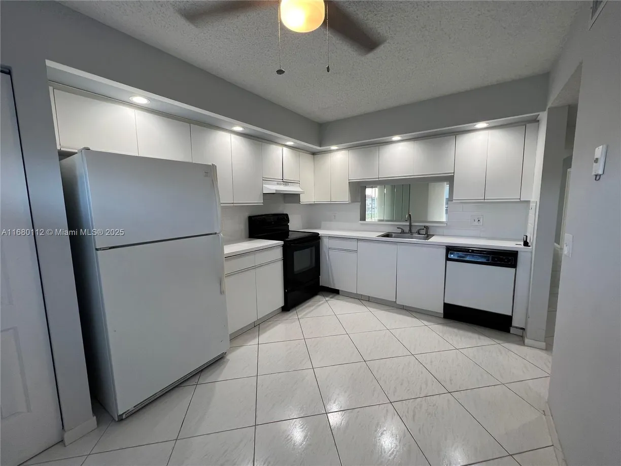 South Florida Real Estate | View 12950 SW 13th St, 409D | Listing