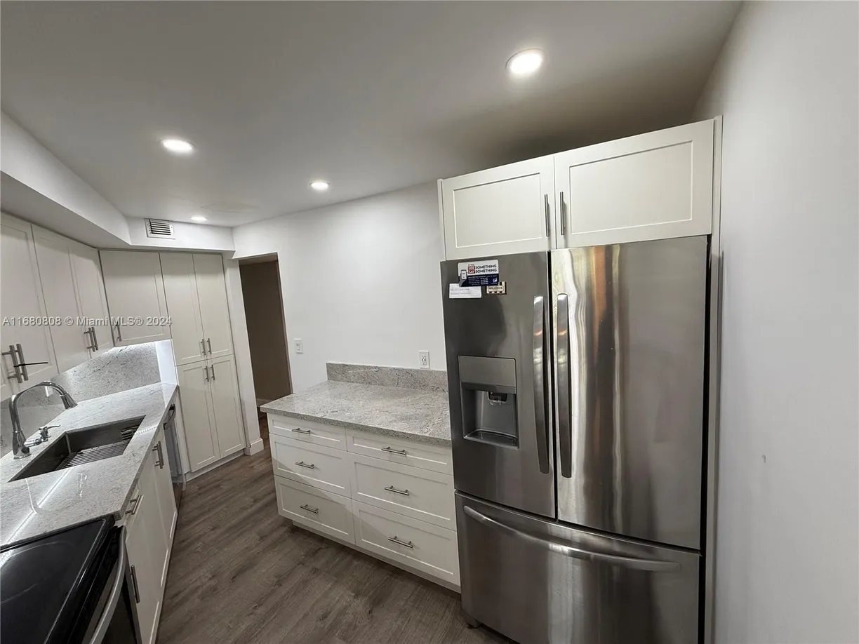 South Florida Real Estate | View 6921 Environ Blvd, 2T | Listing
