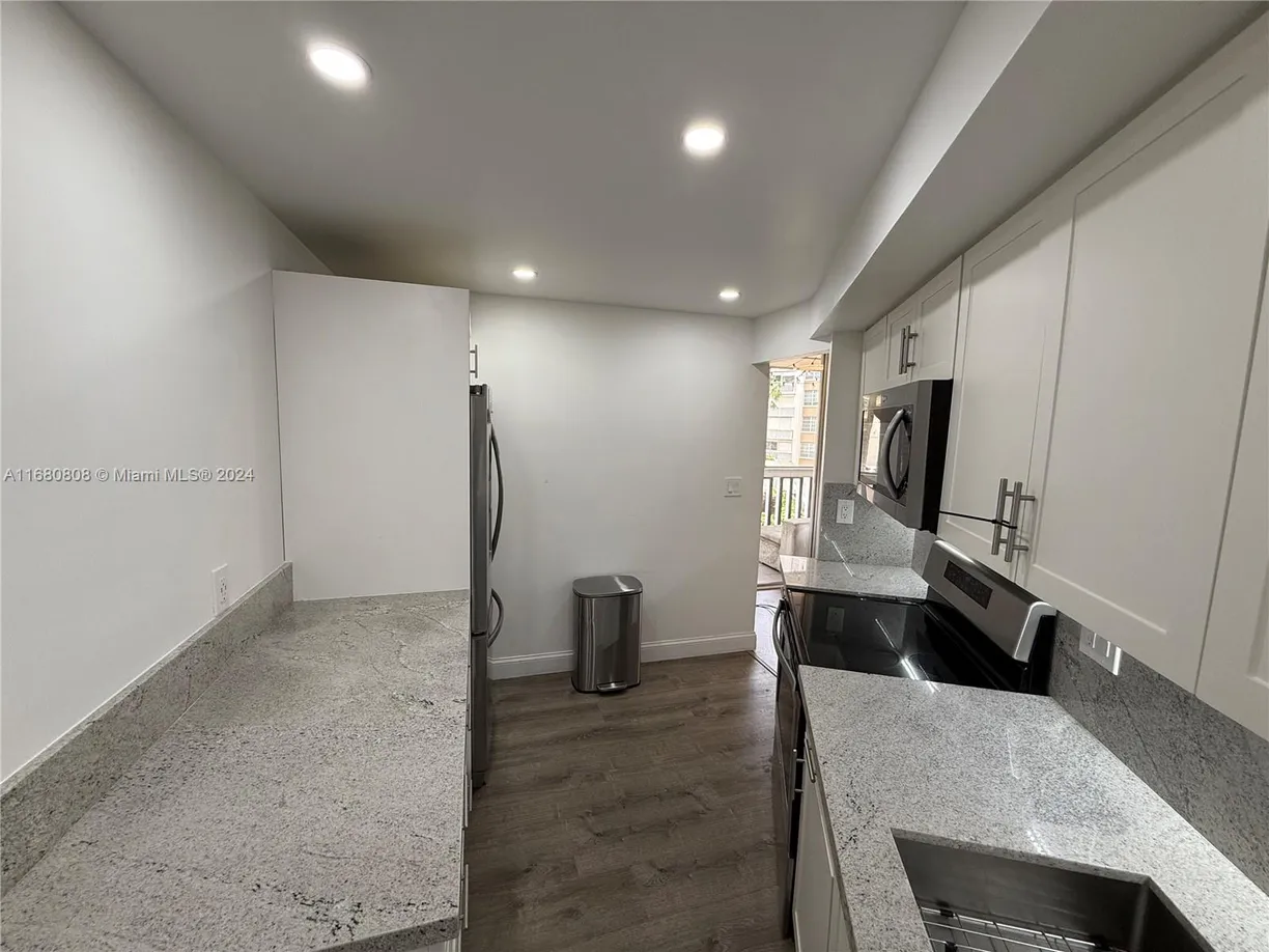 South Florida Real Estate | View 6921 Environ Blvd, 2T | 2 Beds, 2 Baths