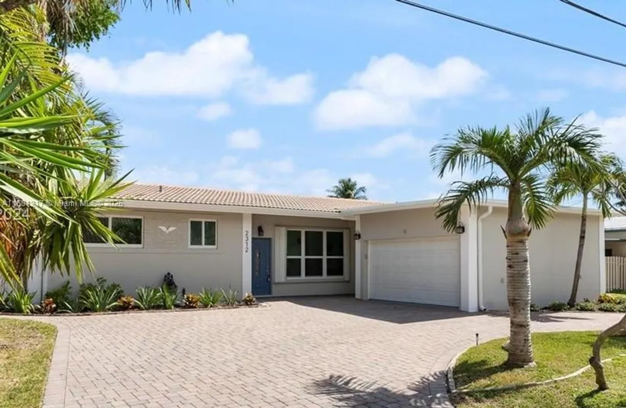 South Florida Real Estate | View 2312 NE 17th Ave | 3 Beds, 2 Baths