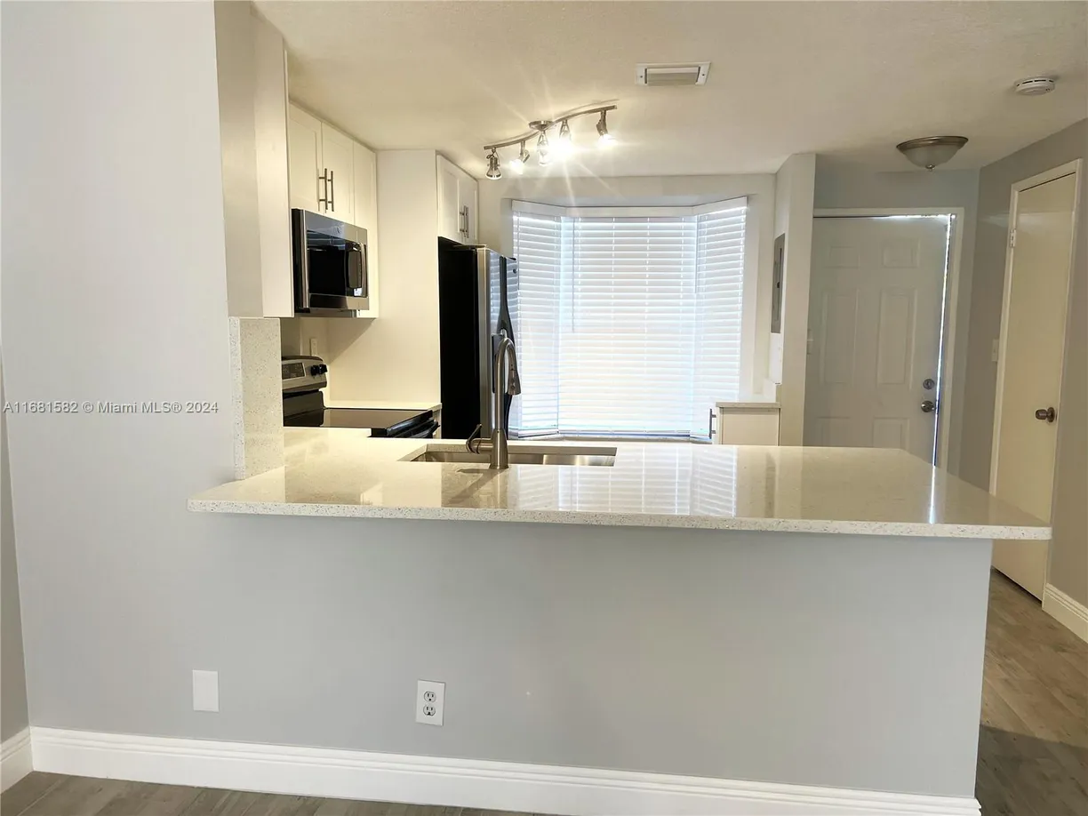 South Florida Real Estate | View 2605 NE 15th St, 2605 | 2 Beds, 2 Baths