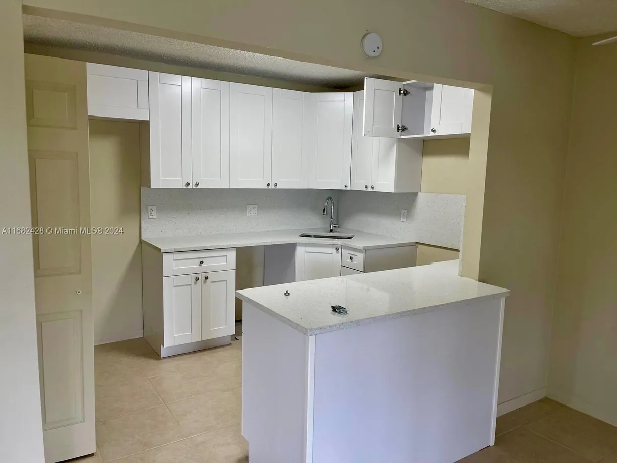 South Florida Real Estate | View 305 Pine Ridge Cir, A-2 | Listing