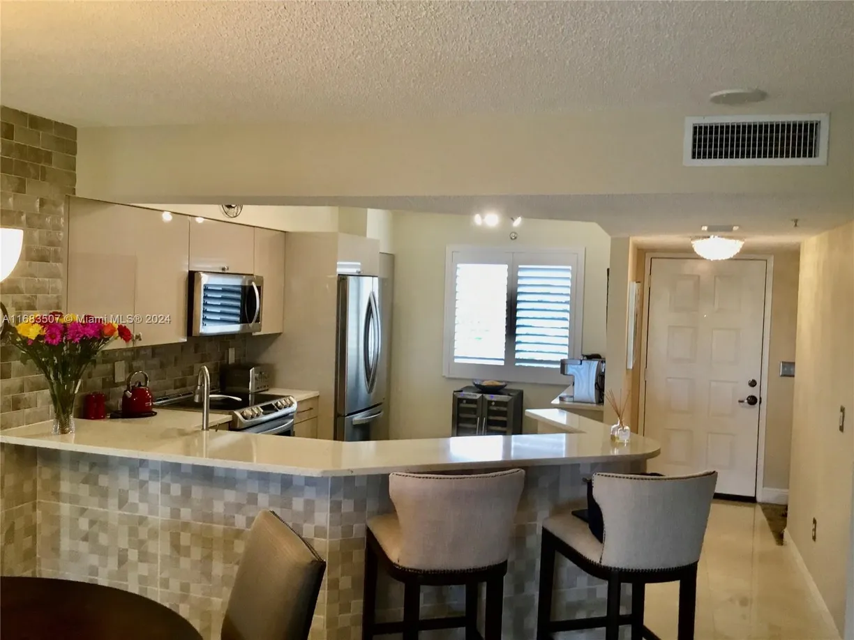 South Florida Real Estate | View 2334 S Cypress Bend Dr, 501 | Listing