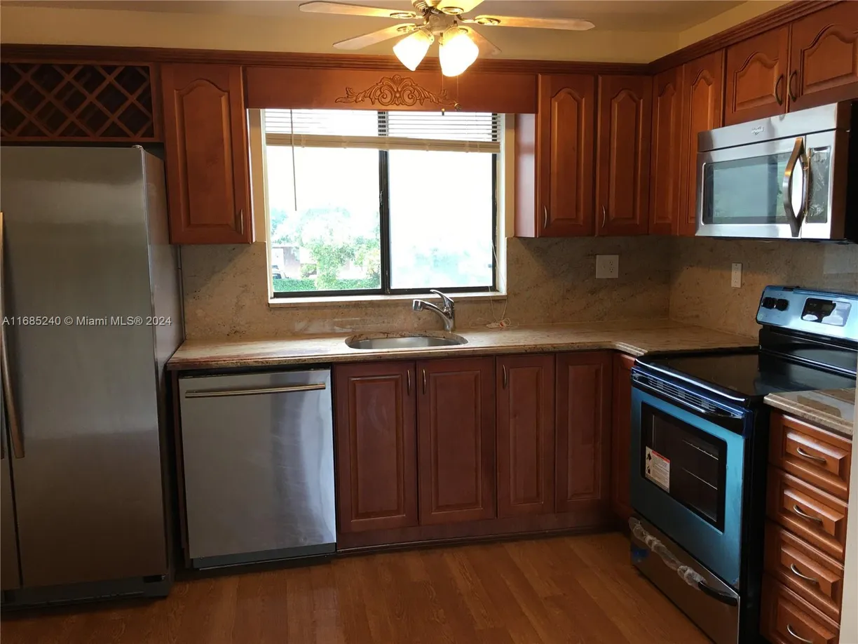 South Florida Real Estate | View 2710 W 60th Pl, 203 | 2 Beds, 2 Baths