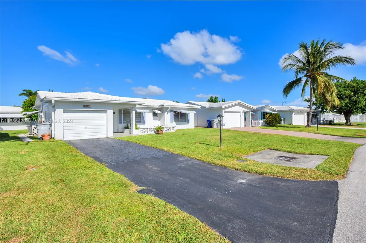 South Florida Real Estate | View 2851 W Golf Blvd | Listing