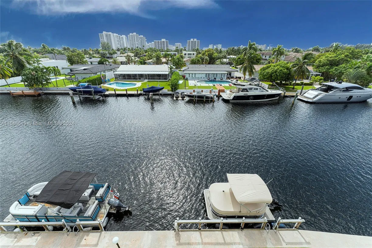 South Florida Real Estate | View 455 Paradise Isle Blvd, 402 | 1 Bed, 1 Bath