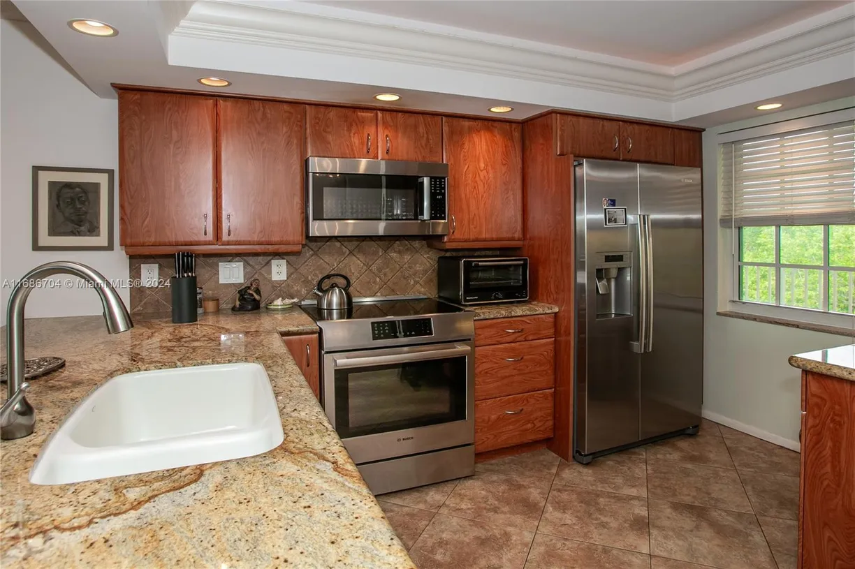 South Florida Real Estate | View 4000 Cypress Grove Way, 510 | 3 Beds, 2 Baths