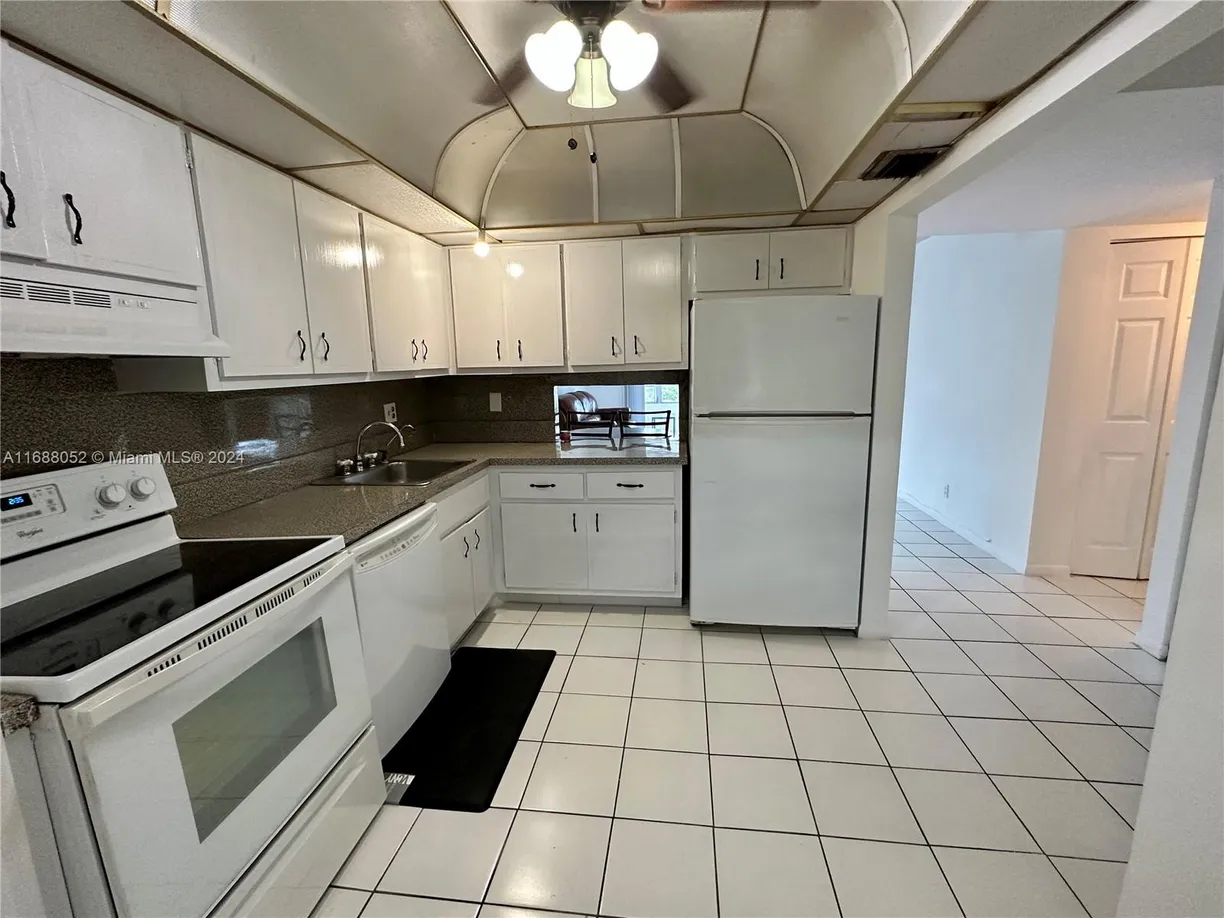 South Florida Real Estate | View 3051 NW 46TH AVE, 203 | 2 Beds, 2 Baths