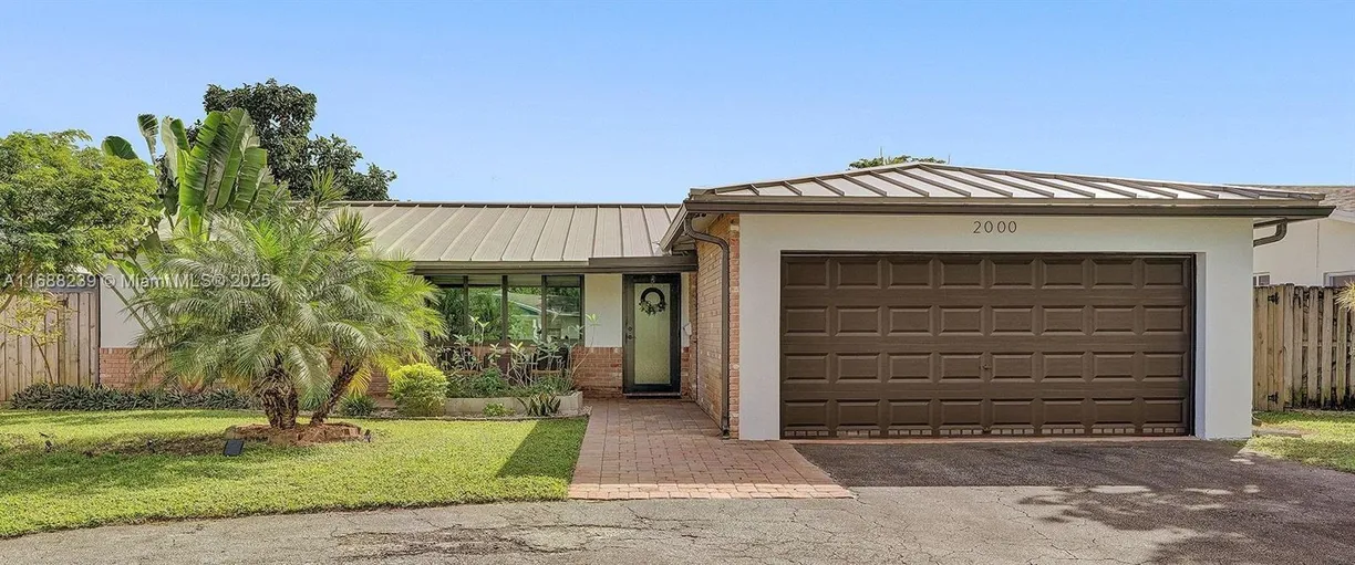 South Florida Real Estate | View 2000 NW 38th St | 3 Beds, 2 Baths
