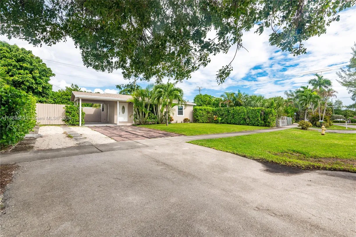 South Florida Real Estate | View 421 NE 44th St | 2 Beds, 2 Baths