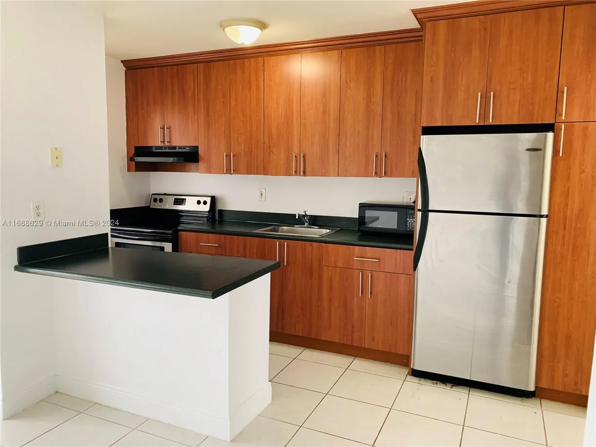 South Florida Real Estate | View 4071 N Dixie Hwy, 23 | 1 Bed, 1 Bath