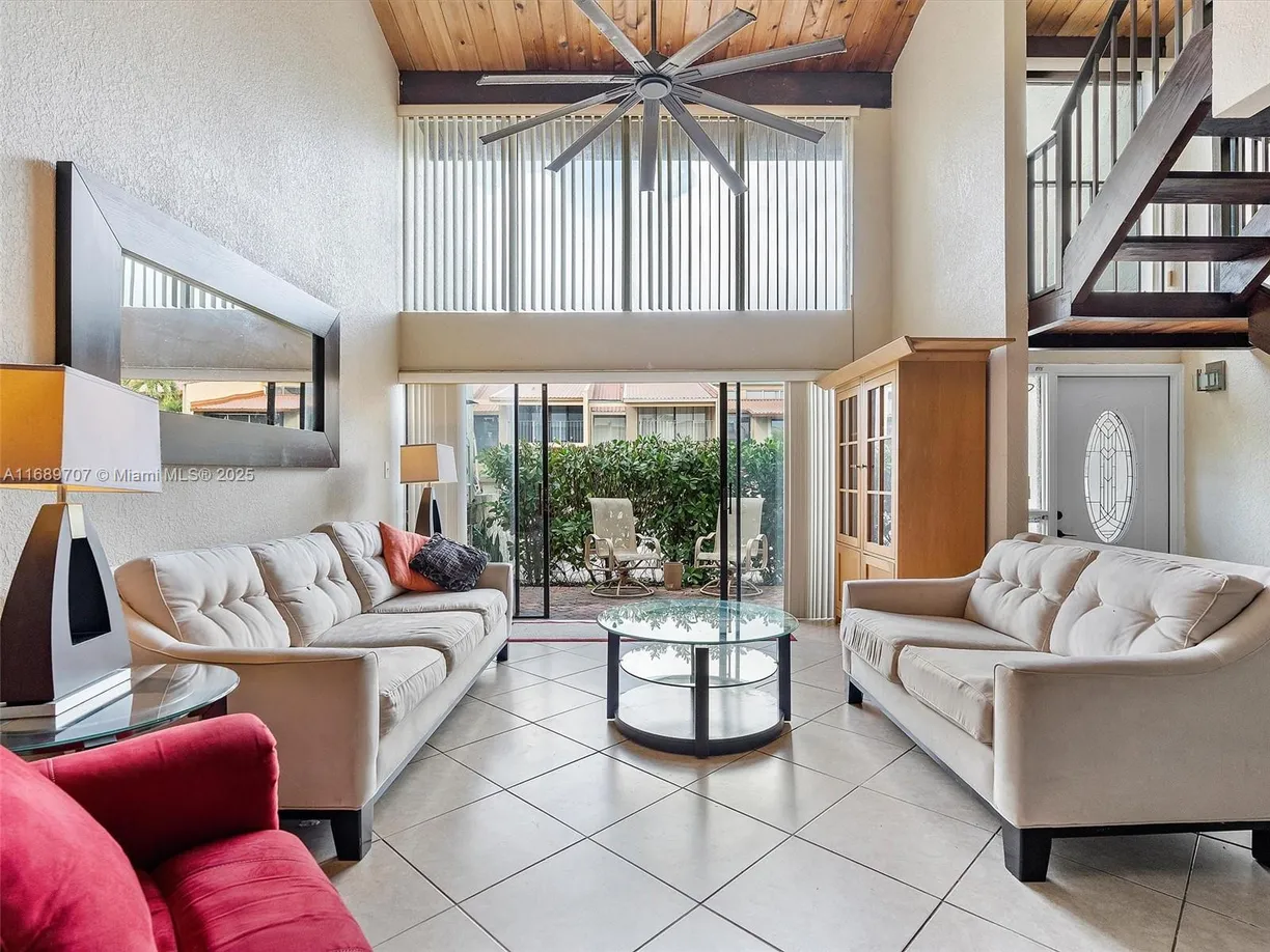 South Florida Real Estate | View 741 E Coco Plum Cir, 5 | 3 Beds, 2 Baths