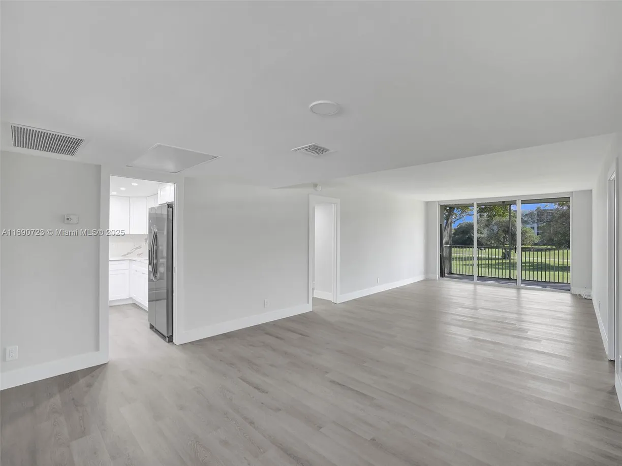 South Florida Real Estate | View 3700 Oaks Clubhouse Dr, 203 | Listing