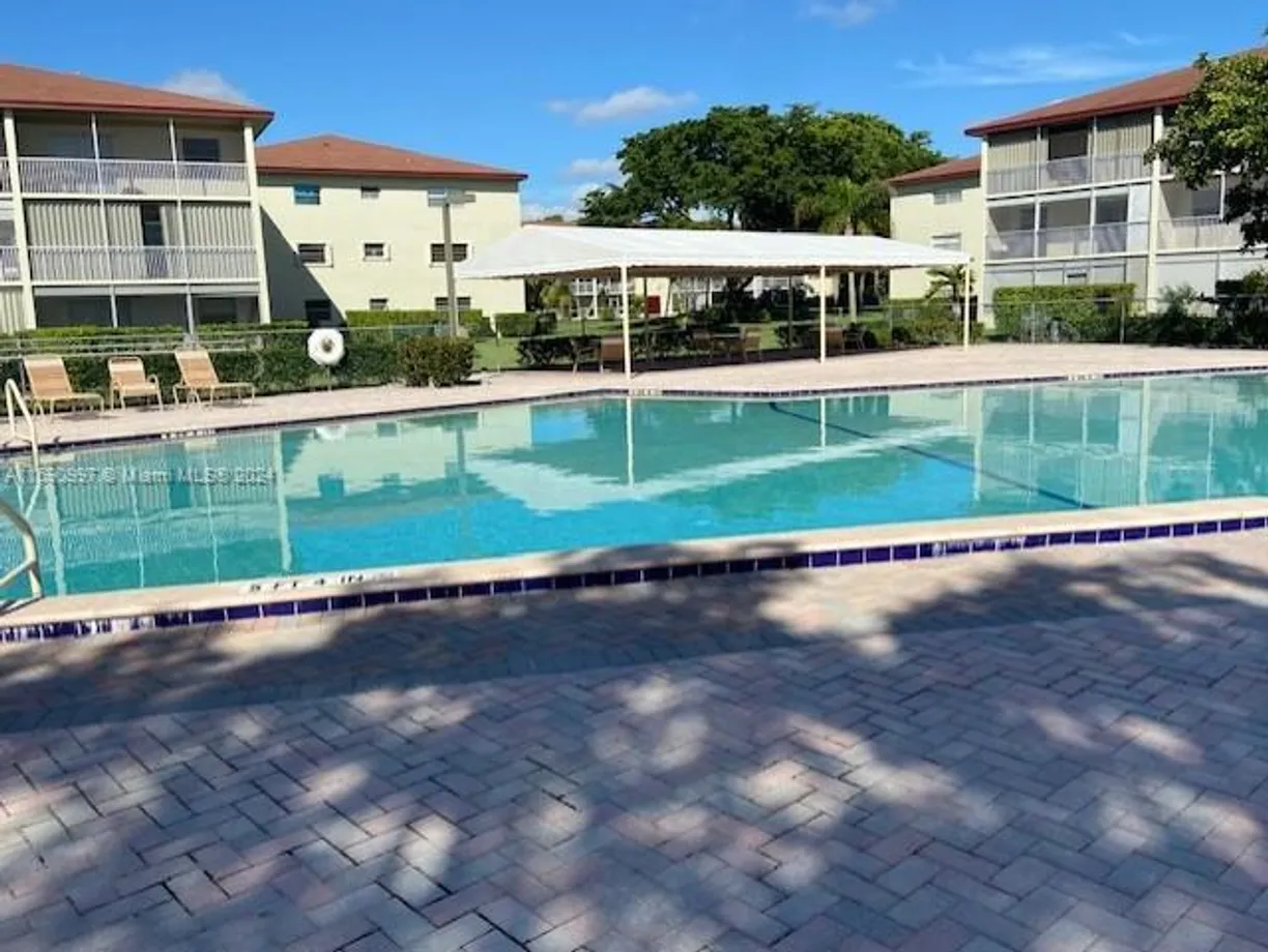 South Florida Real Estate | View 13455 SW 3rd St, 302S | Listing