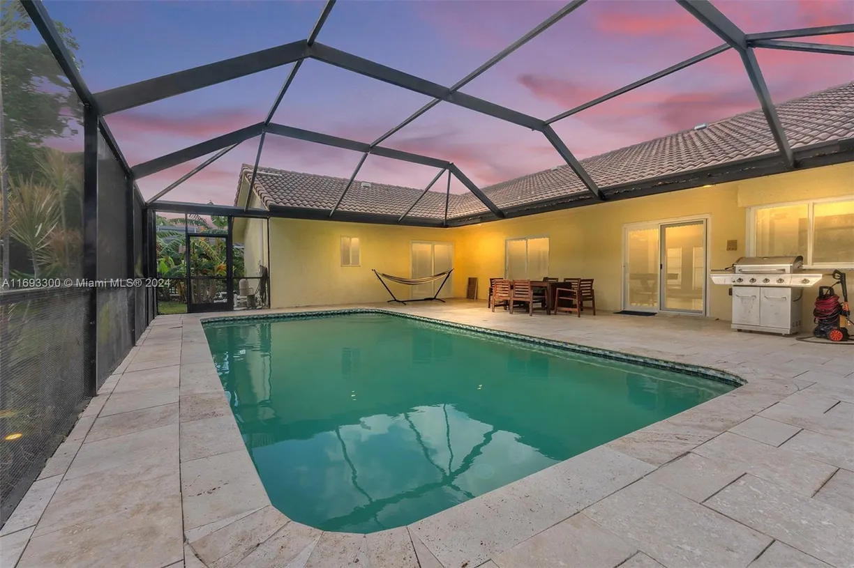 South Florida Real Estate | View 11388 NW 18th Mnr | 4 Beds, 2 Baths
