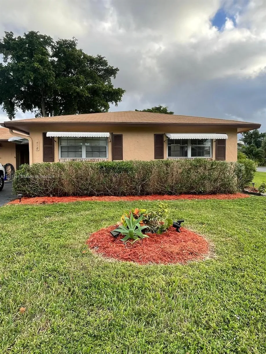 South Florida Real Estate | View 718 Whippoorwill Ln | 2 Beds, 2 Baths