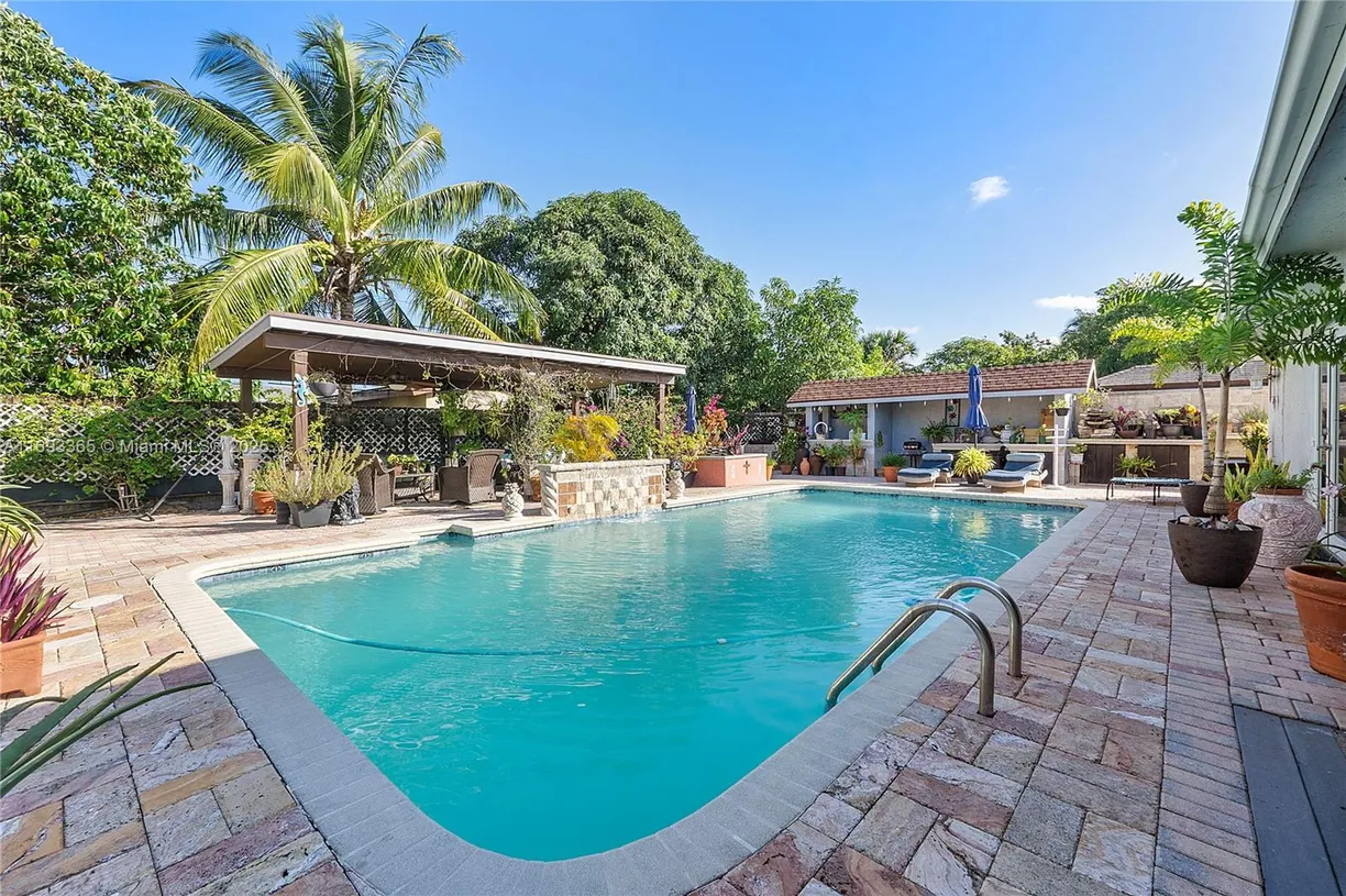 South Florida Real Estate | View 6139 SW 3rd St | 4 Beds, 2 Baths